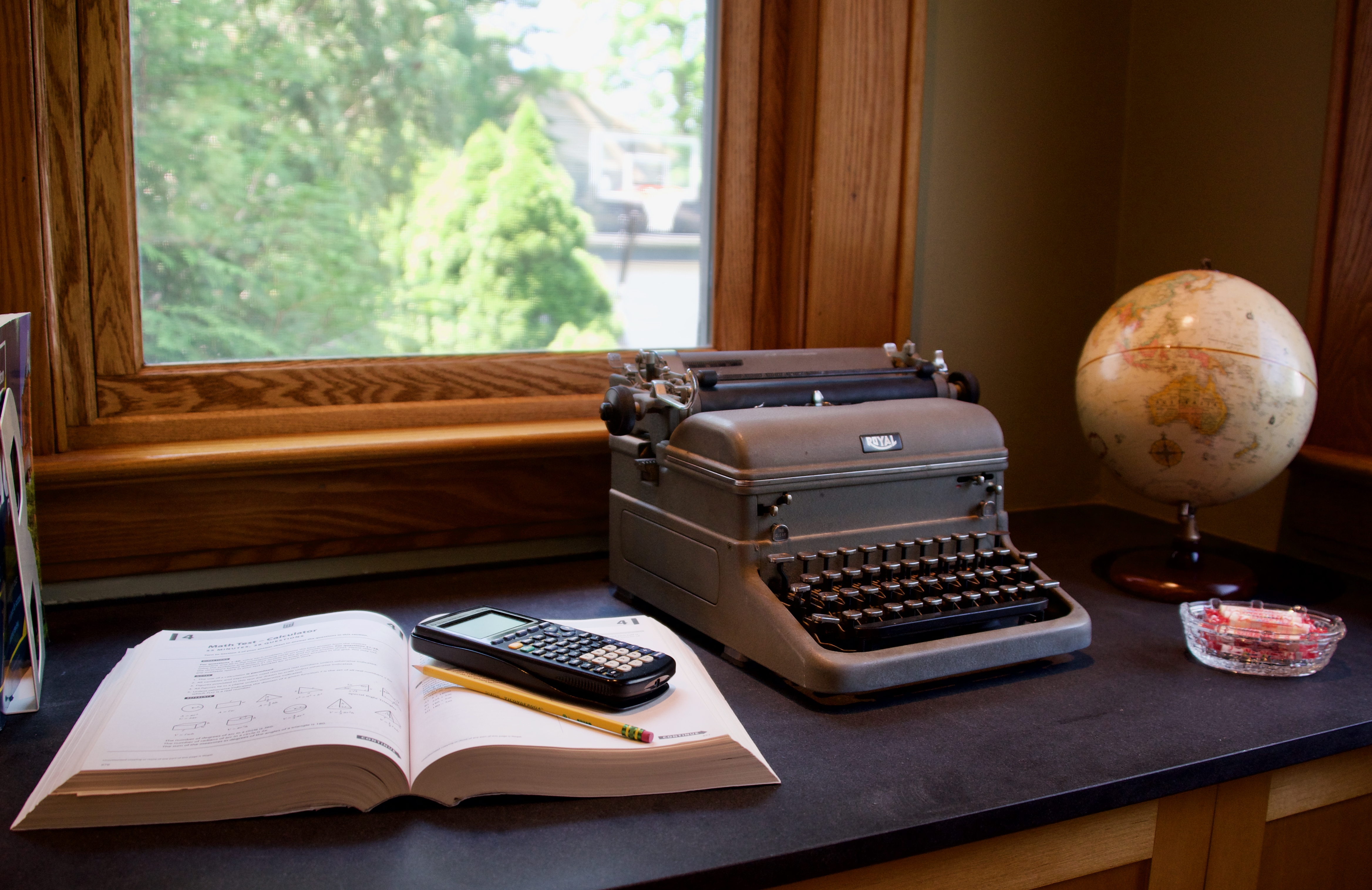 Book, Typewriter, and Globe